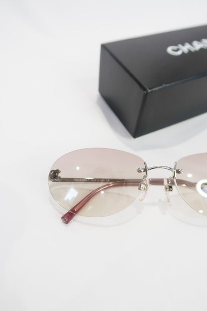 Chanel Pink Rimless Sunglasses