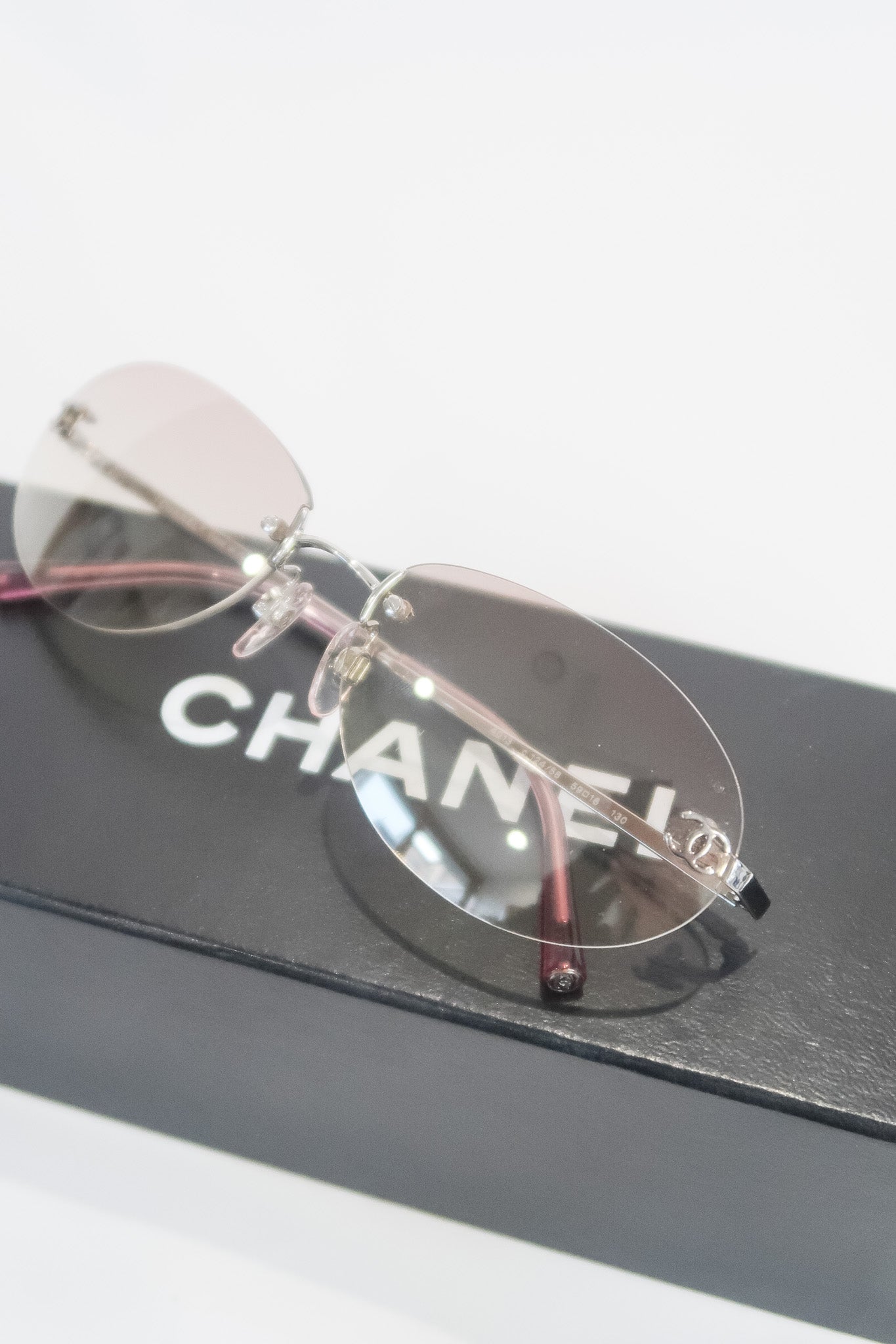 Chanel Pink Rimless Sunglasses