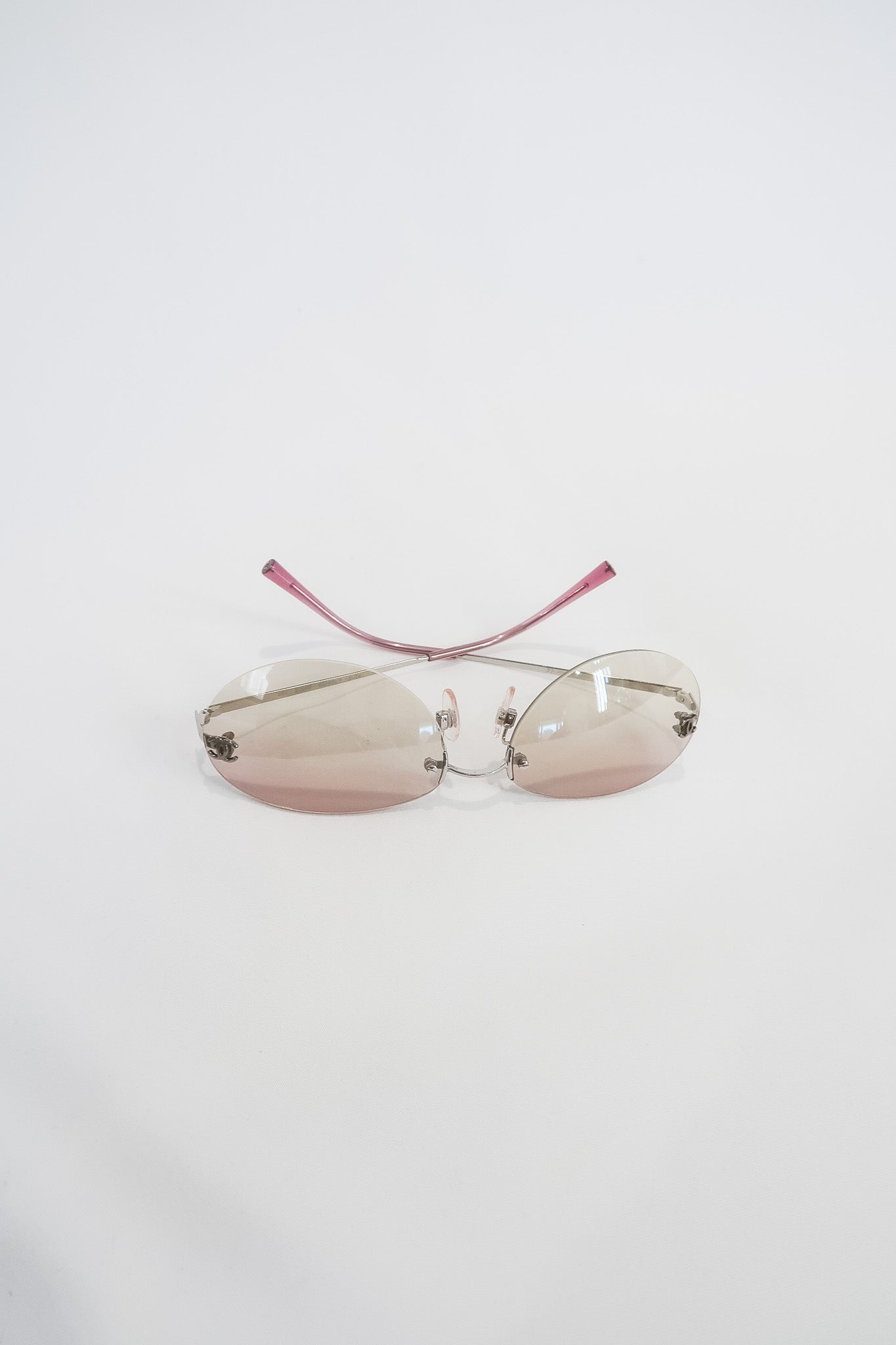 Chanel Pink Rimless Sunglasses